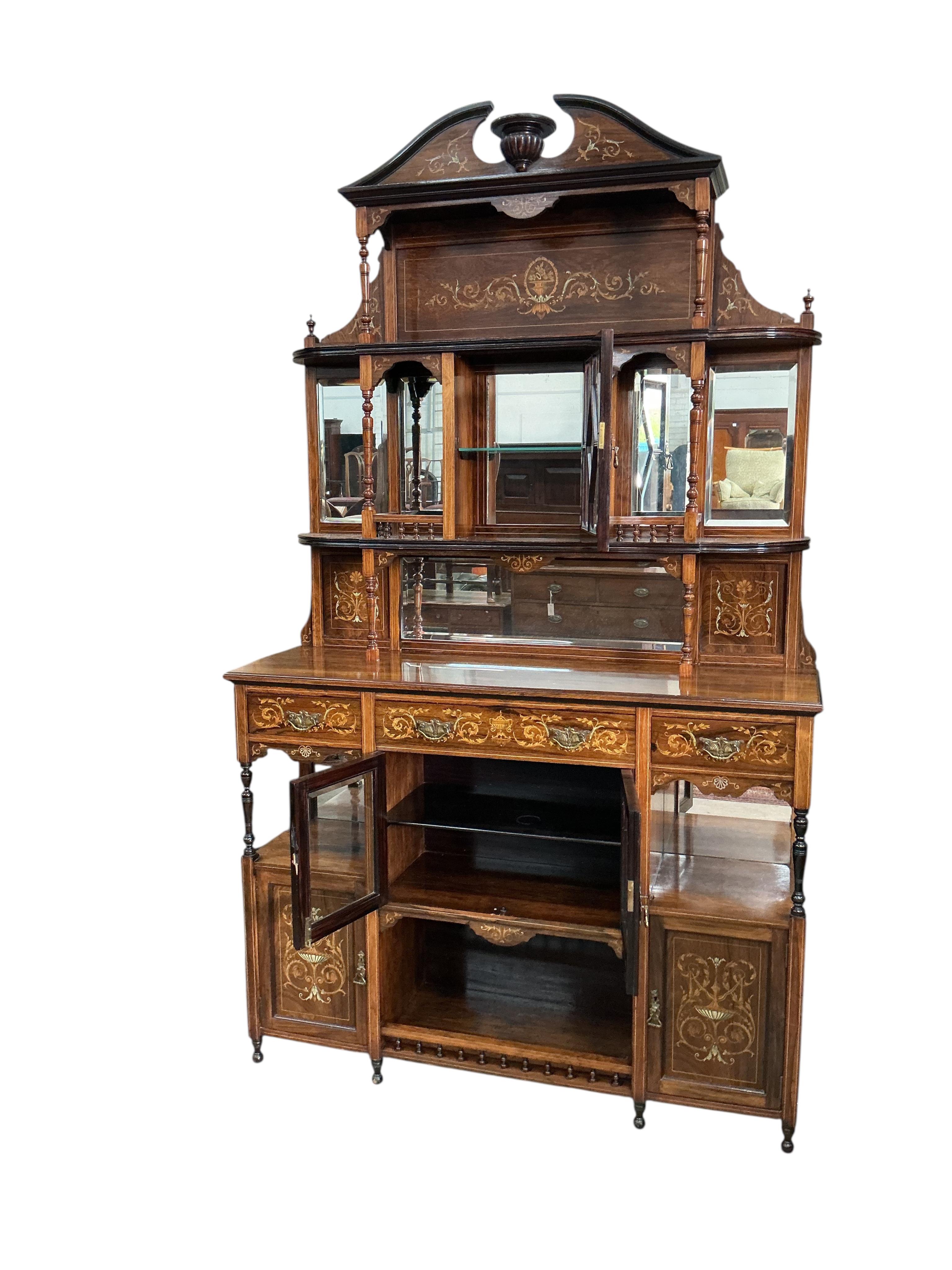 A late Victorian marquetry inlaid rosewood side cabinet, width 138cm, depth 42cm, height 228cm